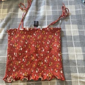 Ribbed floral tube stop with straps